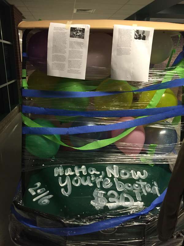 For this year’s senior prank, McNeil High School seniors filled the campus with thousands of balloons. They also hit this campus patrol cart, which they tagged with a message in shaving cream: “Haha. Now you’re booted. $30!” 
