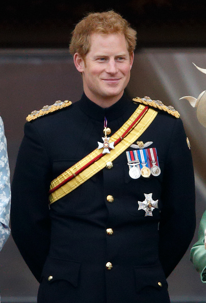 LONDON, UNITED KINGDOM - JUNE 13: (EMBARGOED FOR PUBLICATION IN UK NEWSPAPERS UNTIL 48 HOURS AFTER CREATE DATE AND TIME) Prince Harry stands on the balcony of Buckingham Palace during Trooping the Colour on June 13, 2015 in London, England. The ceremony is Queen Elizabeth II's annual birthday parade and dates back to the time of Charles II in the 17th Century, when the Colours of a regiment were used as a rallying point in battle. (Photo by Max Mumby/Indigo/Getty Images)