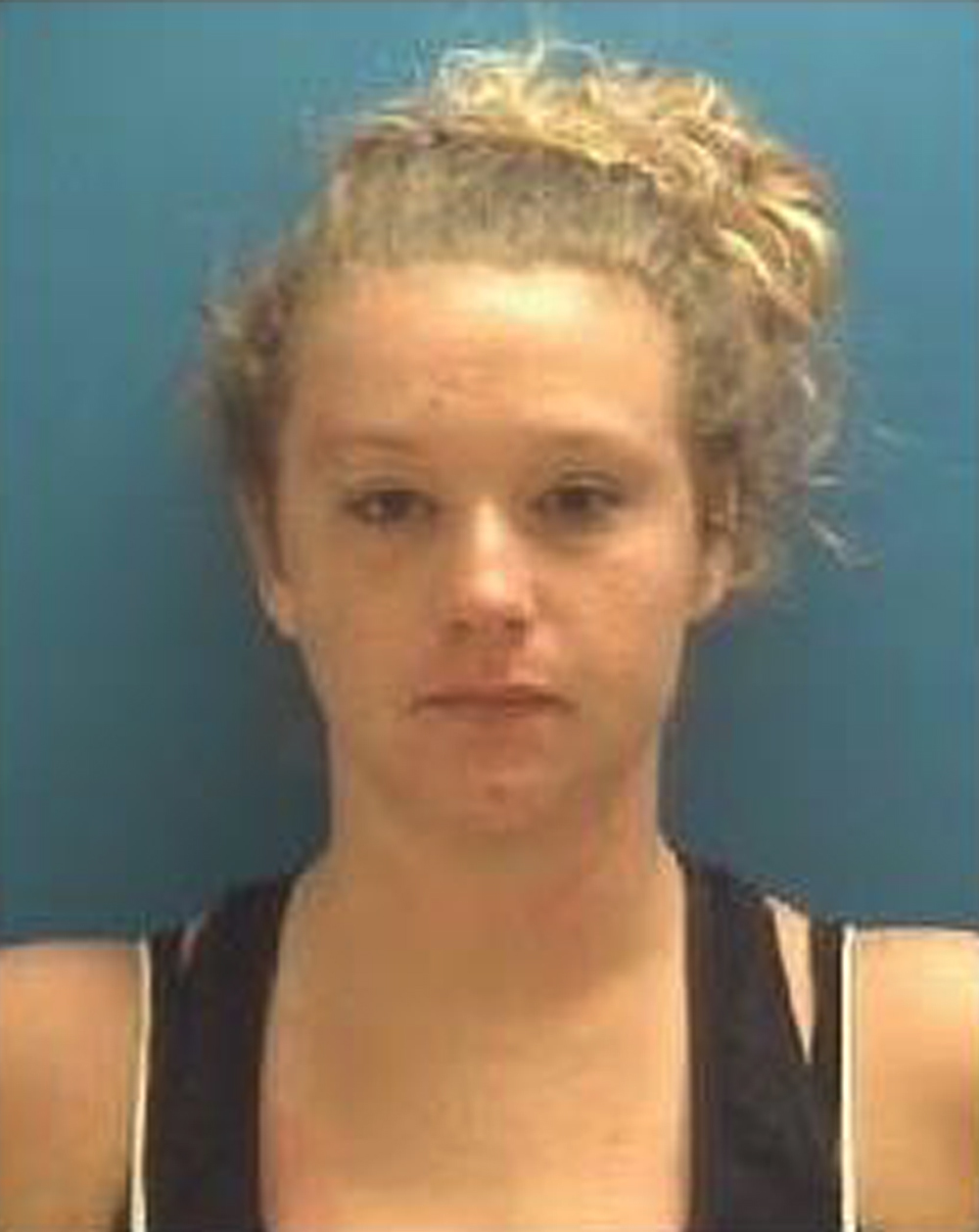 This photo provided by the Town of Hope Police Department shows Erika Hurt, who was charged of child neglect and possession of drug paraphernalia. The police department in Hope, Ind., said Hurt was found passed out from an overdose with her baby in the back seat of the car on Saturday, Oct. 22, 2016. (Town of Hope Police Department via AP)