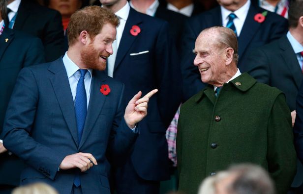 LONDON, ENGLAND - OCTOBER 31: Prince Harry, Prince Phillip and Prince William enjoy the atmosphere during the 2015 Rugby World Cup Final match between New Zealand and Australia at Twickenham Stadium on October 31, 2015 in London, United Kingdom. (Photo by Phil Walter/Getty Images)