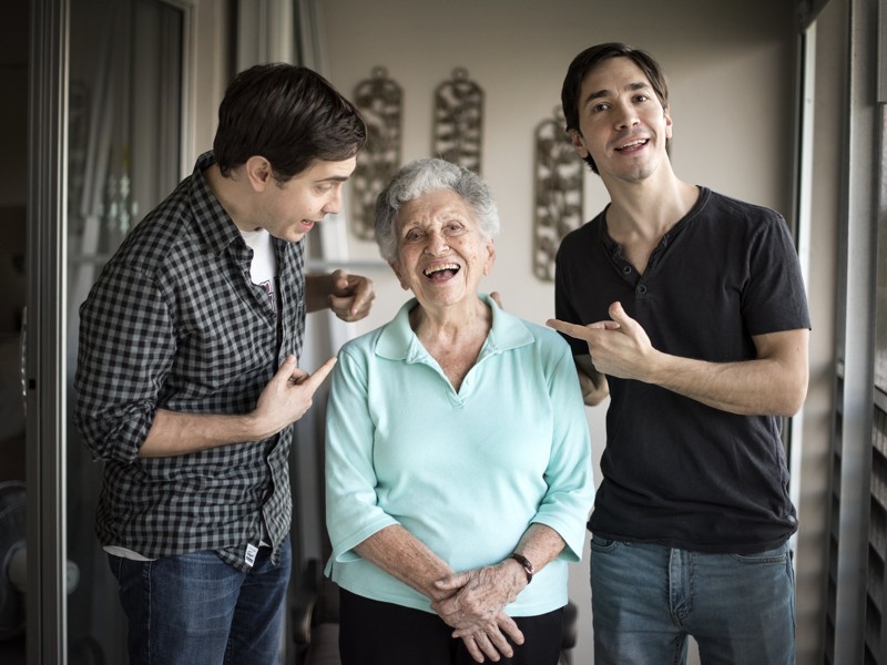 Christian Long (left) and his brother, actor Justin Long (right) entertain their 100 year old grandmother, Jody Lesniak. (Melanie Bell / The Palm Beach Post) Palm Beach Post Staff Writer 