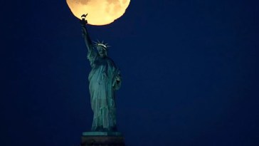 Super Blue Blood Moon over Statue of Liberty