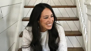 Joanna Gaines sitting on stairs