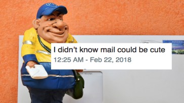 Tiny mail man next to envelope