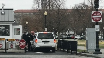 A white minivan that rammed a White House security barricade along 17th st at E st NW in Washington DC