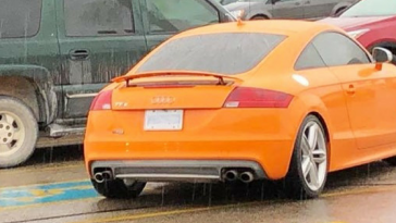 car parked in handicap spot