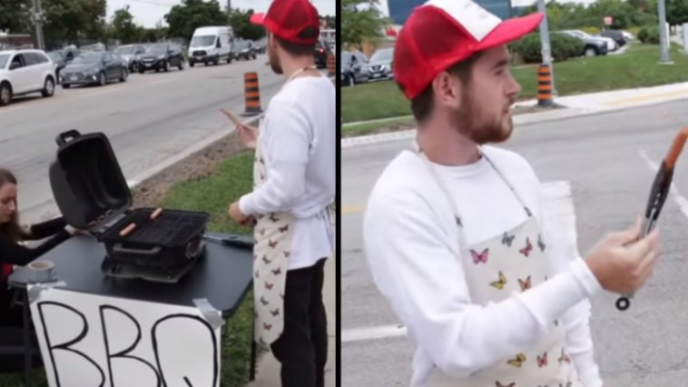 Man Barbecues Hot Dogs Next To Animal Rights Protest