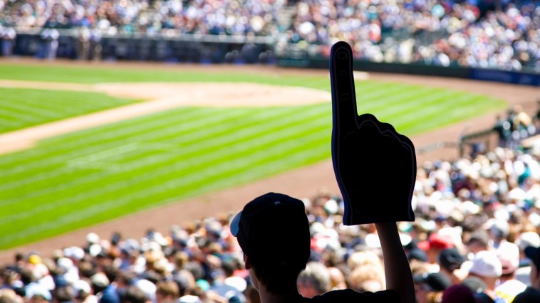 Baseball Fan Goes Viral For Working In The Middle Of MLB Game