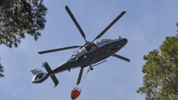 Helicopter Goes To Get Water To Combat Forest Fire, Ends Up Crashing Into Lake
