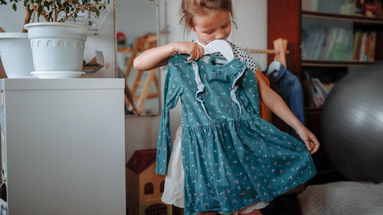 The Horrifying Messages A Mother Noticed On Her Young Daughter's Innocent Looking Dress