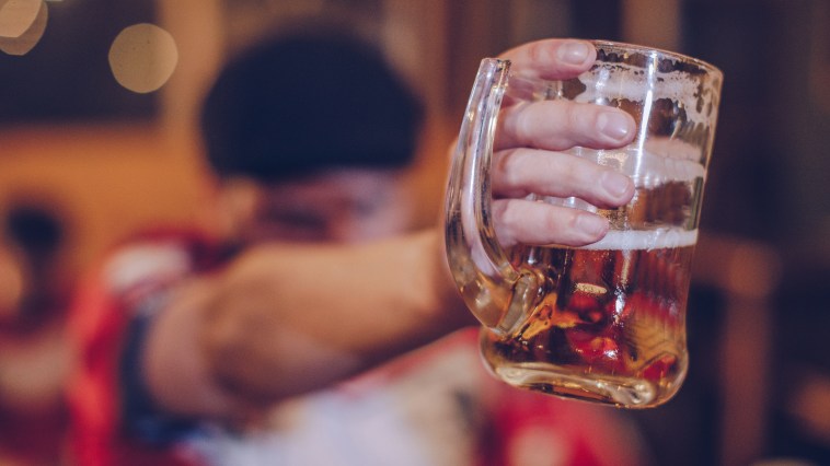 Beer Lovers Show Off Their Strength By Holding Steins Of Ale In Competition