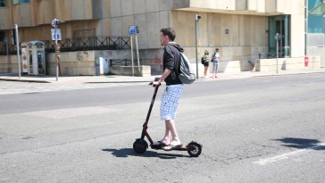 Car Narrowly Avoids Hitting Kid On Scooter, Ends Up Wrecking