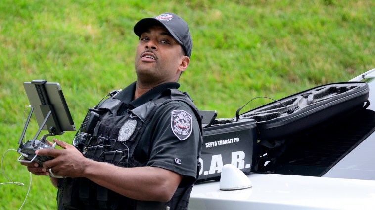 Clueless Criminal Runs Across Busy Highway Unaware He's Being Tracked By A Drone See Video