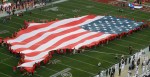 Man Gets Stuck On Giant American Flag During National Anthem Watch Hilarious Video
