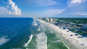 "Right Place At Right Time": Veteran Florida Surfer Hailed A Hero After Rescuing Father And Son From Rip Tide