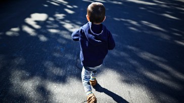 Police Officer Rescues Child From Busy Highway