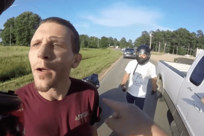 This road raging driver had something to say, but the biker’s buddy laid him out quick