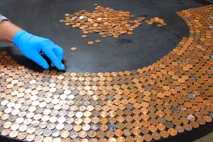 Watch as she tops an old table with $35 of pennies and glaze — the result is incredible!