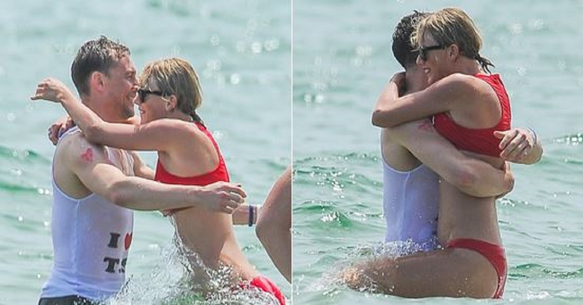 Tom Hiddleston and Taylor Swift are looking cozy at a star-studded Fourth of July bash