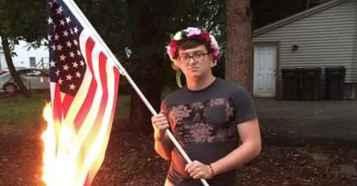 people arrested for burning gay flag