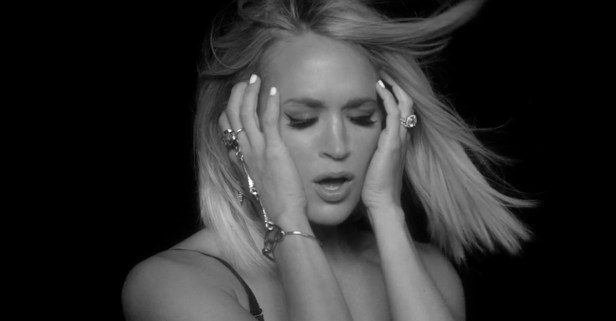 Watch as a smoking Carrie Underwood scolds a cheater in this hot new video