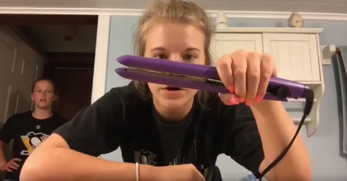 Watch two girls completely freak out when they attempt to pop a popcorn