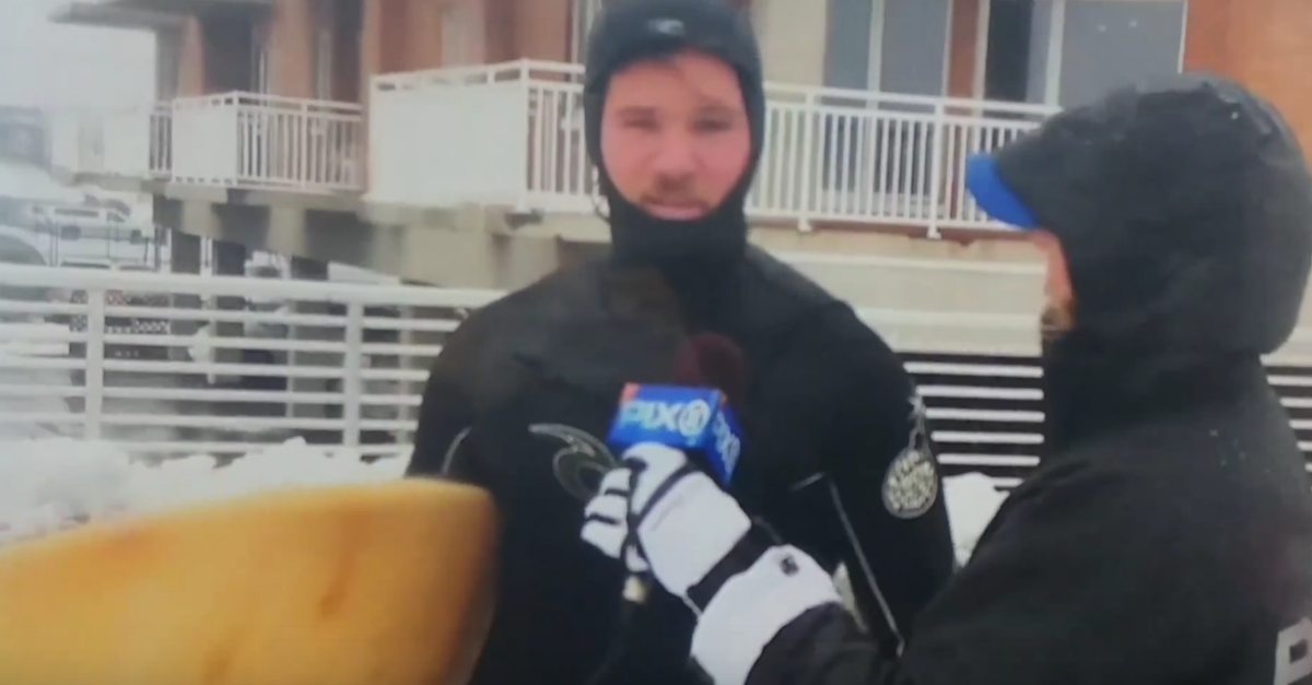 A surfer who was caught in Winter Storm Stella took advantage of his time on camera
