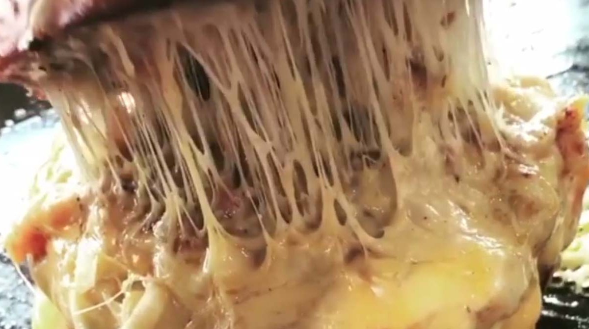 This video compilation of the world’s cheesiest burgers is oddly soothing