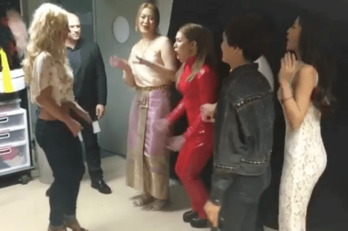 Watch Britney Spears lose all her senses when she meets a fan wearing her “Oops, I Did It Again” catsuit