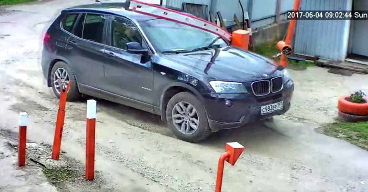 Driver accidentally hits gas and his car goes slamming