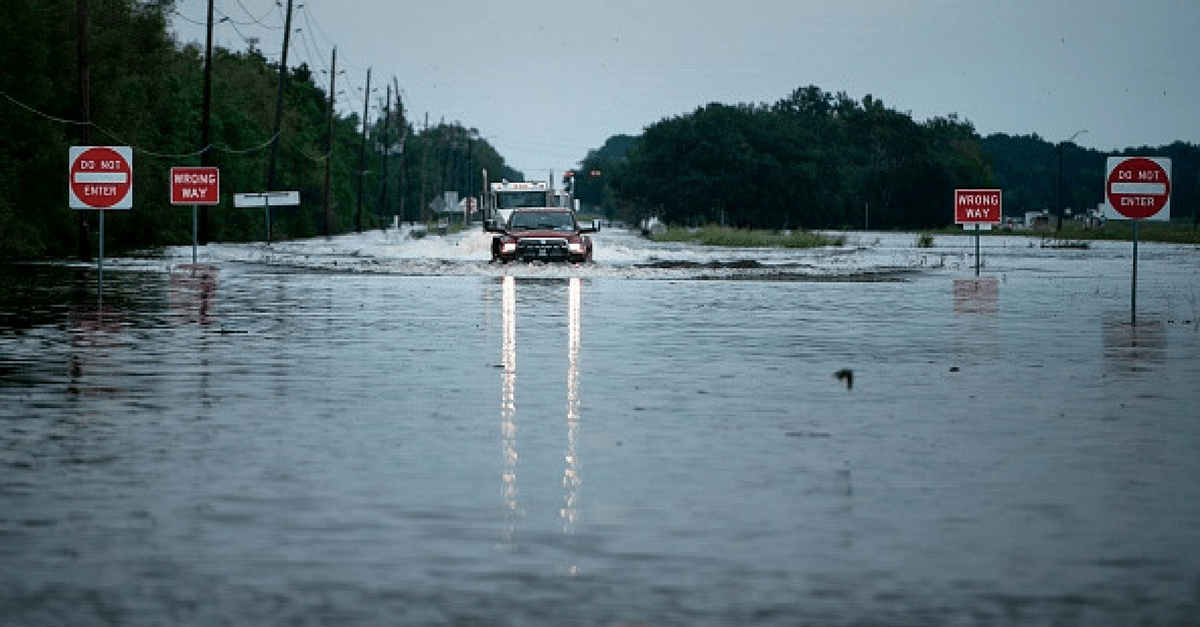 Houstonians claim a refinery and chemical plant dammed their homes by improperly diverting floodwaters