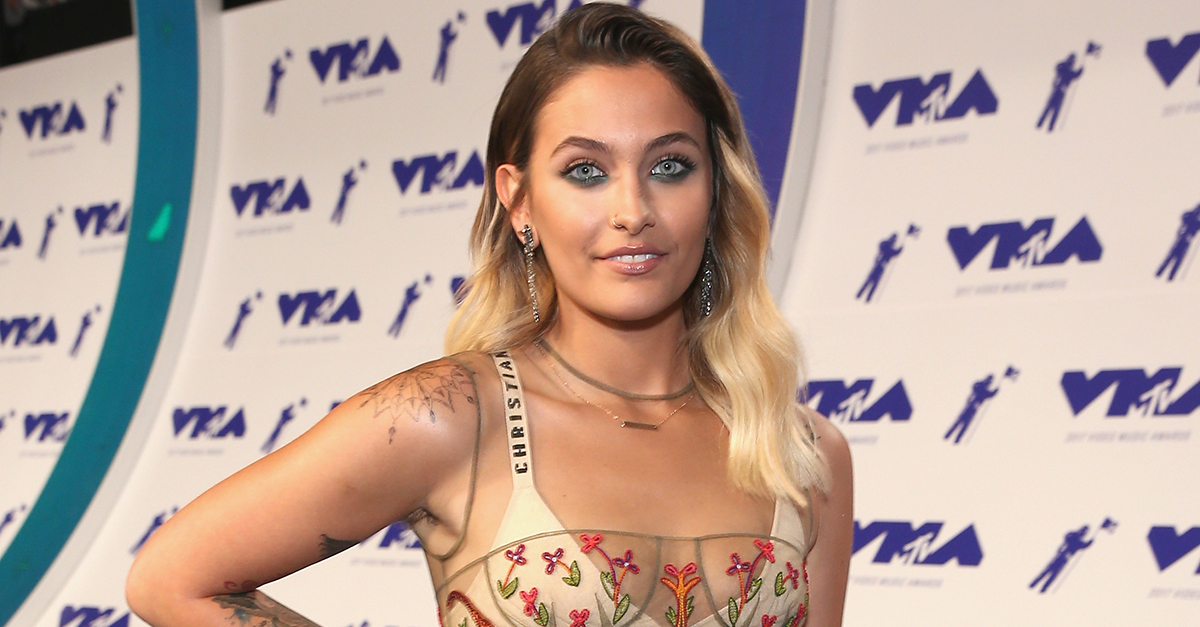 Paris Jackson goes topless to show off her new chest tattoo