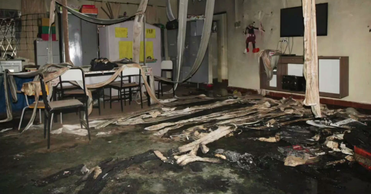Four young children died after a security guard lit a daycare on fire