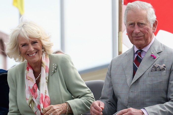 Prince Charles and Duchess Camilla were caught kissing in a rare PDA-filled appearance
