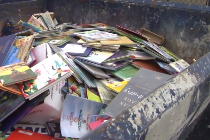 Dumpster filled with books discovered behind elementary school, and it’s not the first time