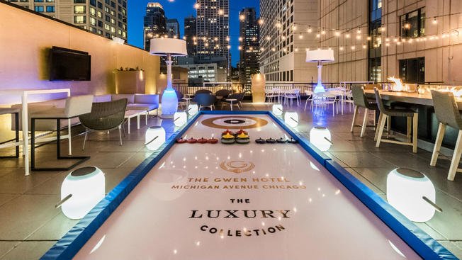 This Chicago hotel just opened a rooftop curling rink and it’s looks like a movie