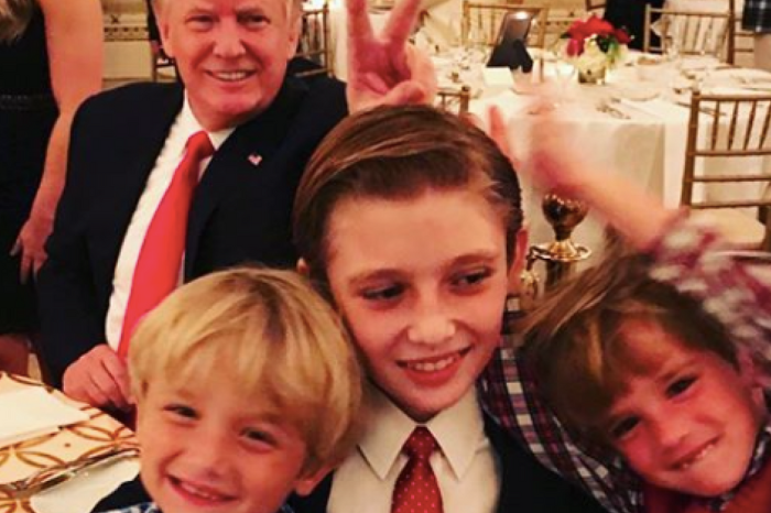 President Trump goofs off with his grandkids and son Barron in family photos from Christmas dinner