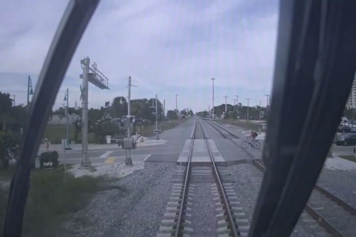 This is the exact moment a man on a bike lost his life to a controversial killer train