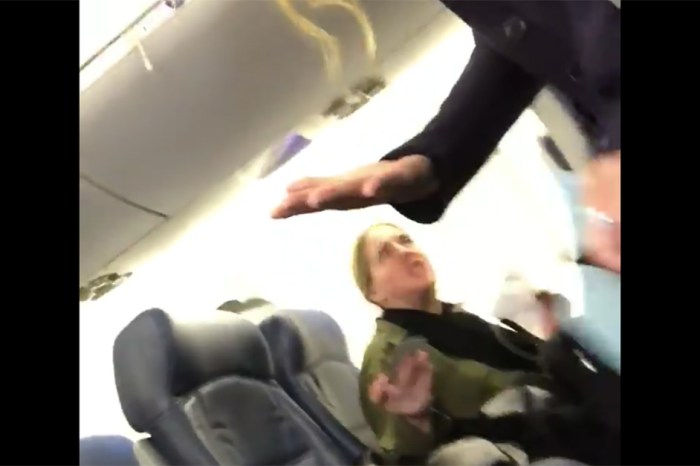 Watch a foul-mouthed woman get booted off her flight for being mean to a mom and her baby