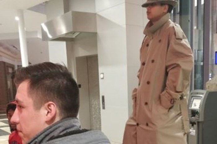 Two kids dressed as a tall man to get into “Black Panther” were caught on video