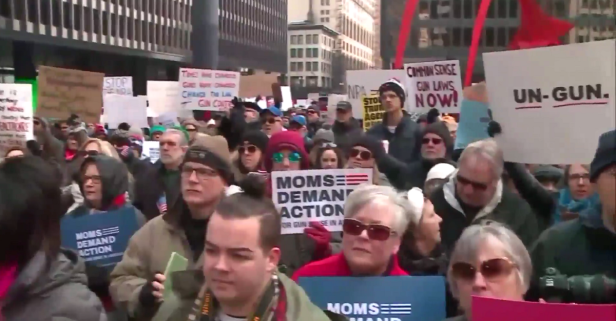 Thousands gathered in downtown Chicago on Sunday to call for gun legislation in wake of recent mass shooting
