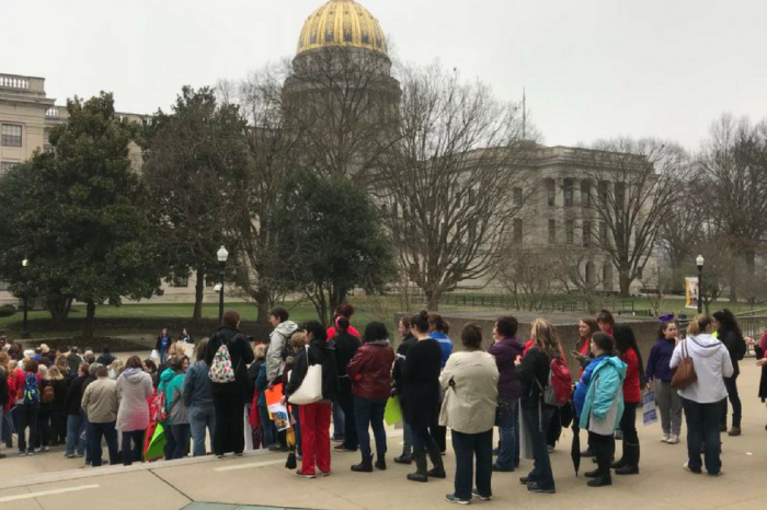 West Virginia public schools close as teachers across the state walk out on the job in strike