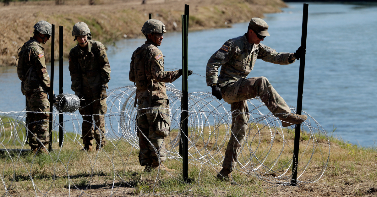 Migrants won’t see armed US soldiers on border | Rare