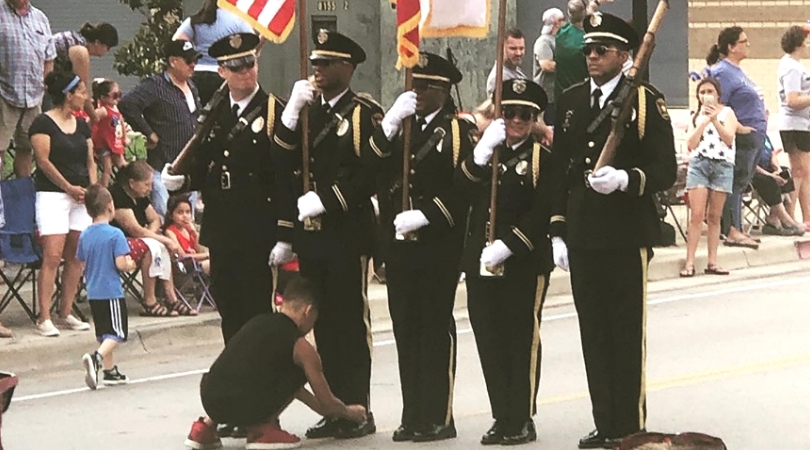 Texas Boy Praised for Tying Honor Guard Member’s Shoe During 4th of July Parade