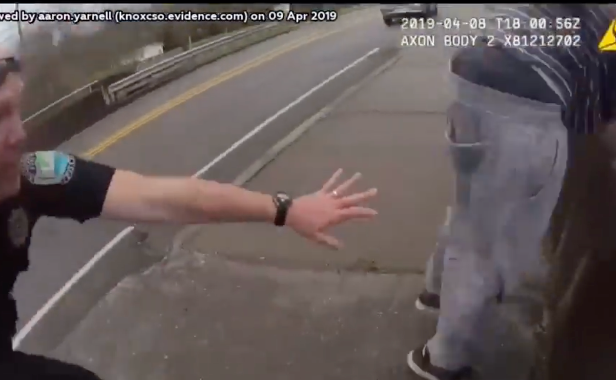 Cop Catches Man Jumping off Bridge