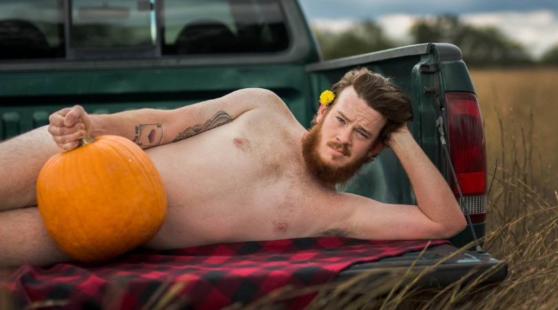 Husband Poses For Pumpkin-Themed Dudeoir Shoot | Rare