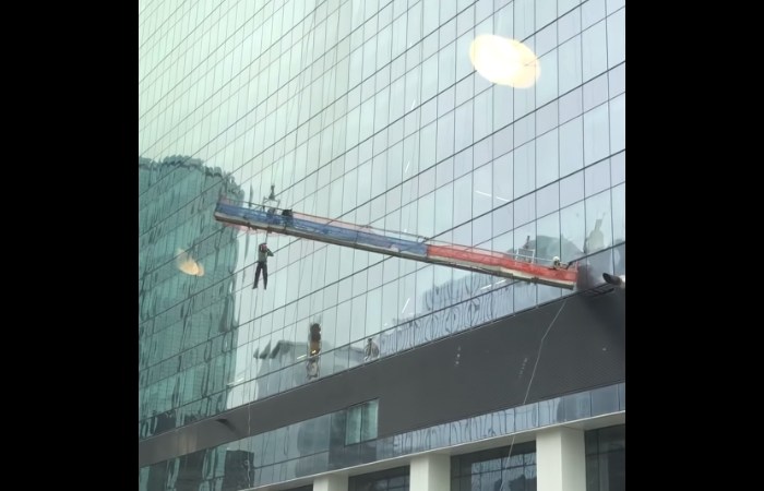 Window Washer Dangling for Dear Life in Crazy Video
