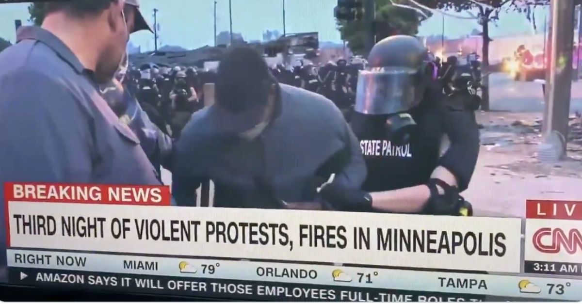 cnn cameraman protester
