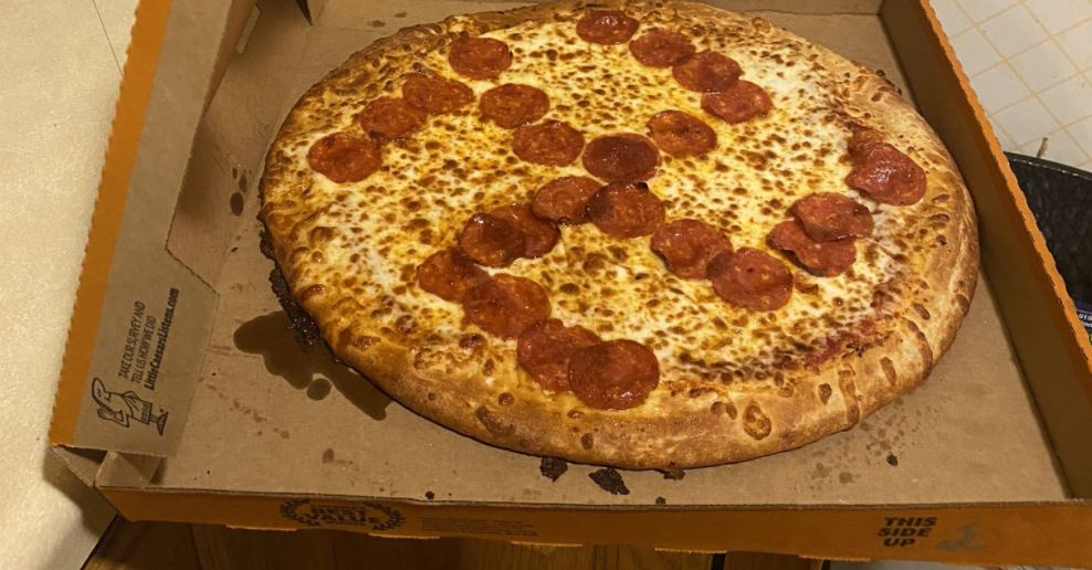 Couple Served Little Caesars Pizza with Pepperonis Shaped as Swastika